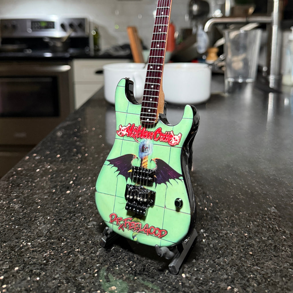 The Complete Mötley Crüe Album Cover Mini Axe Set – All 4 Official Mini Guitar Designs