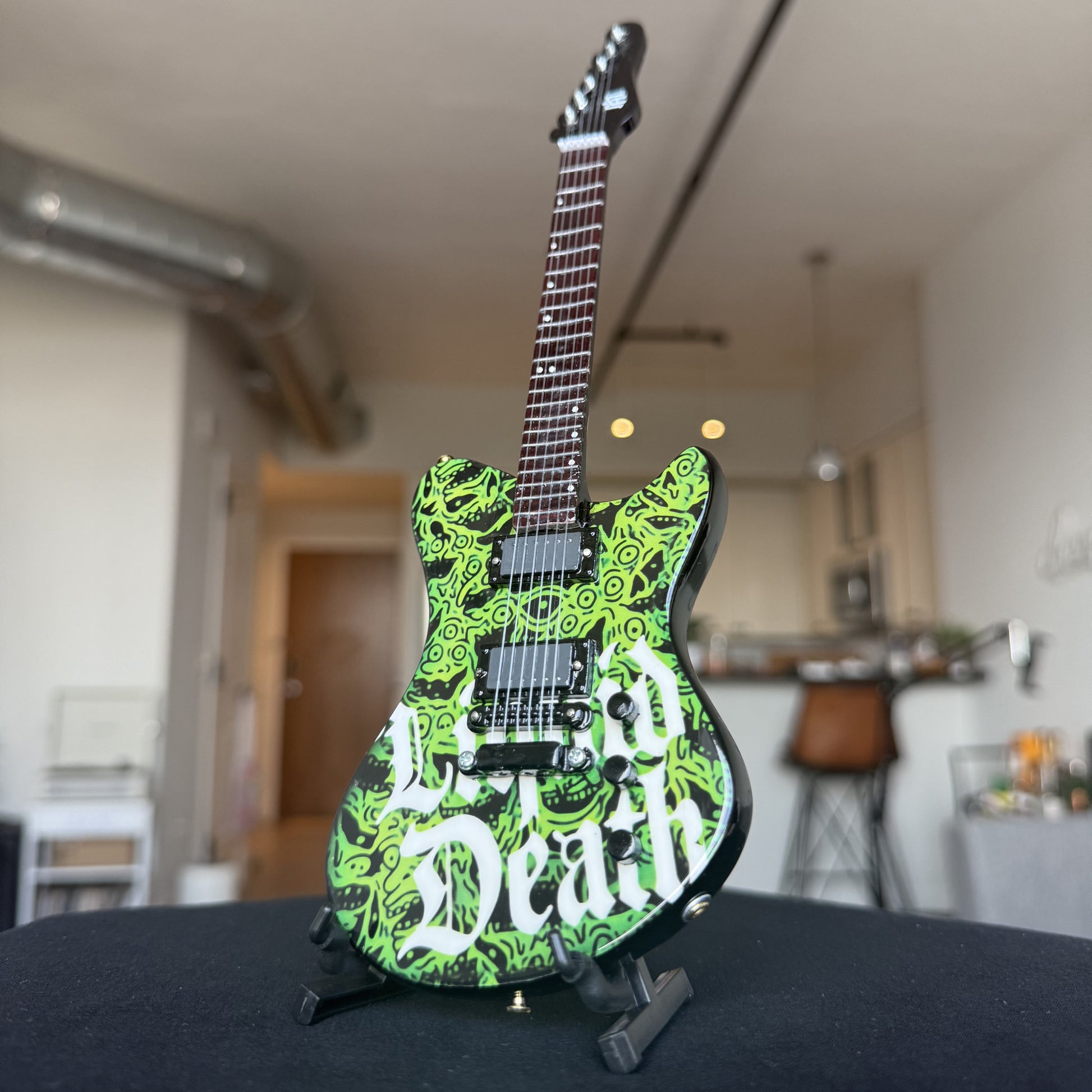 Liquid Death "Melted Faces" Mini Axe