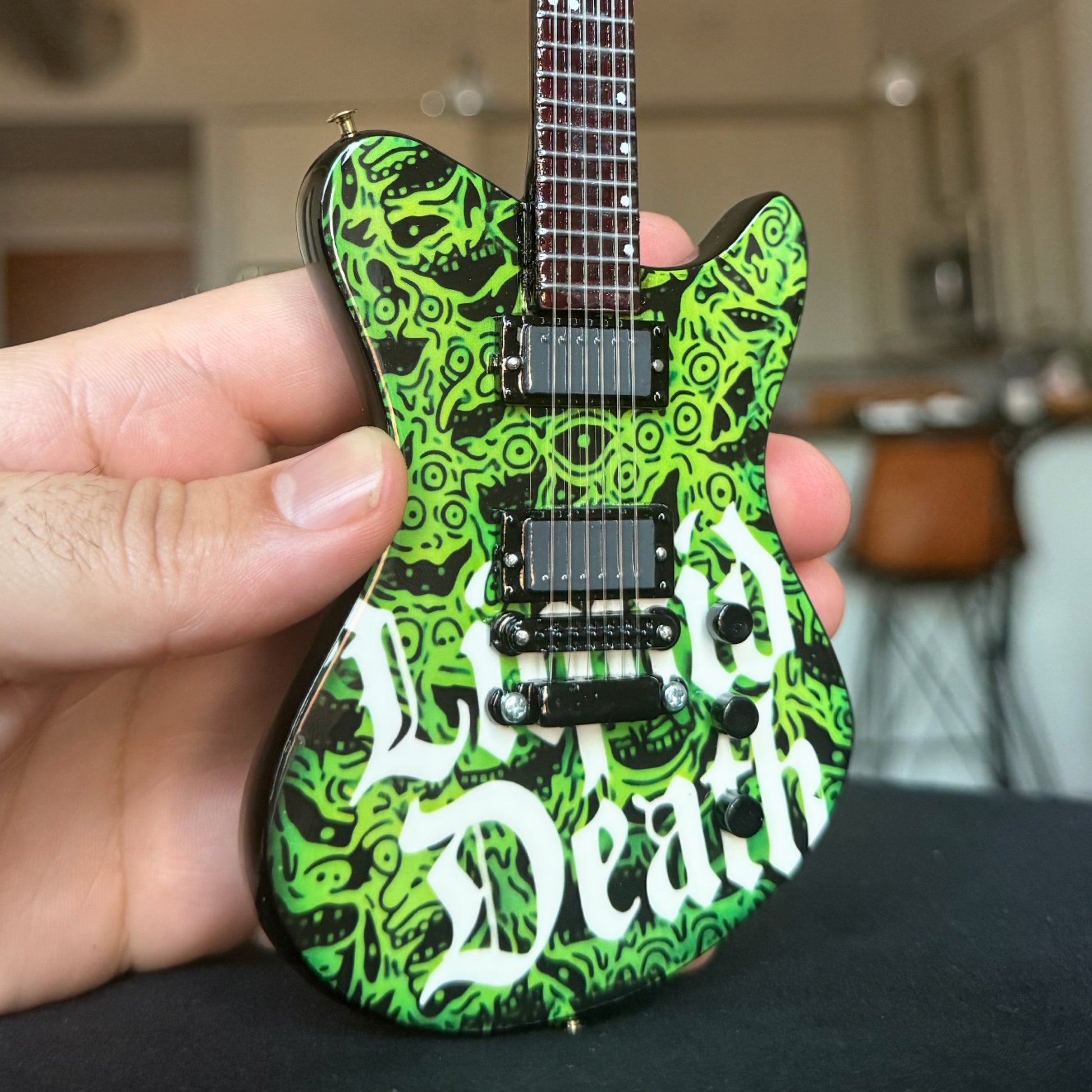 Liquid Death "Melted Faces" Mini Axe