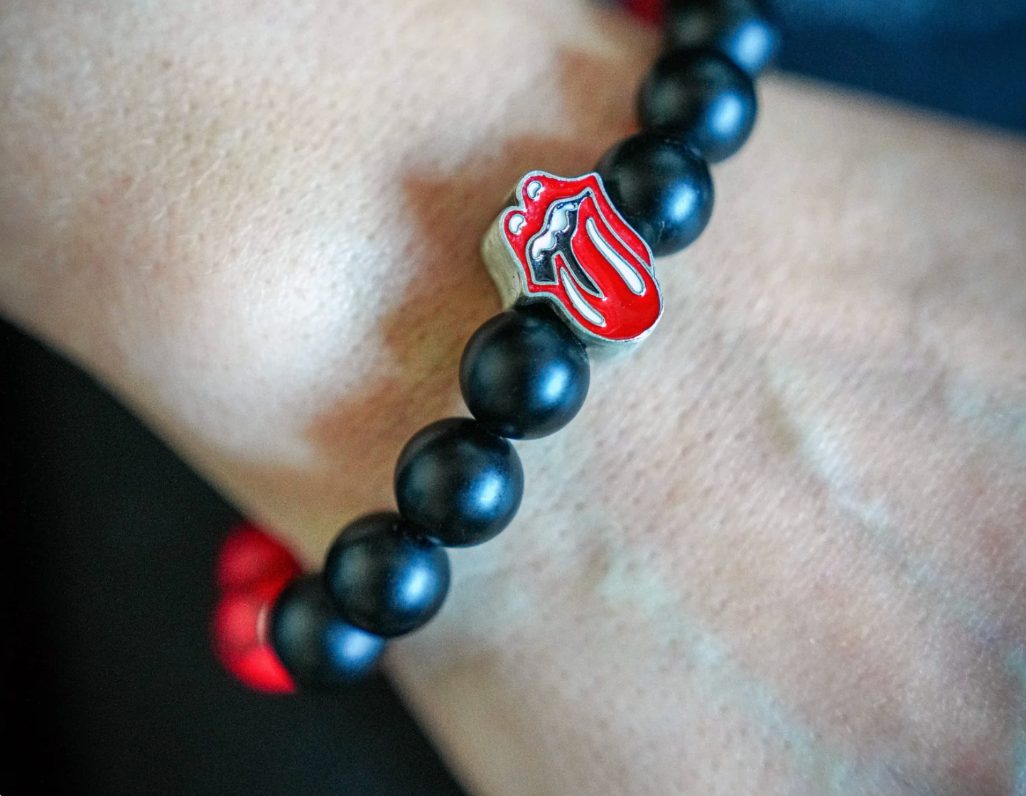 The Rolling Stones "Tongue and Lips" Miniature Guitar and Bracelet